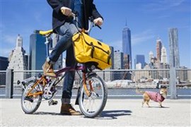 A Brompton folding bike fitted with the Game Bag